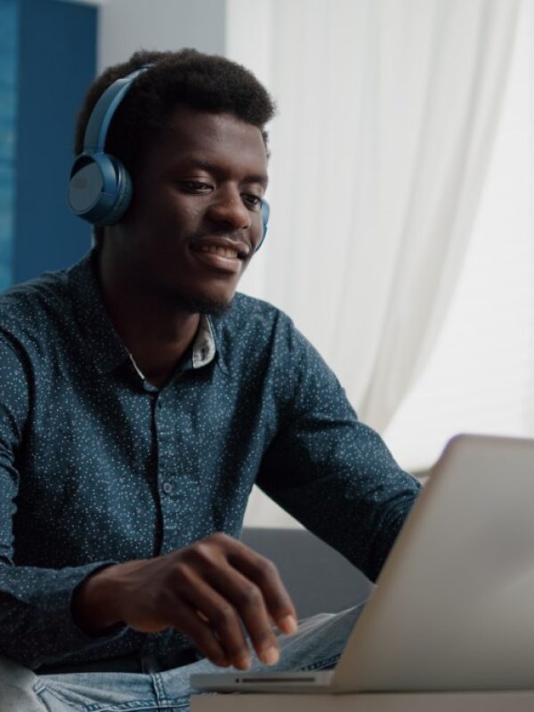 african-american-man-with-headphone-on-watching-movie-on-streaming-services.jpg