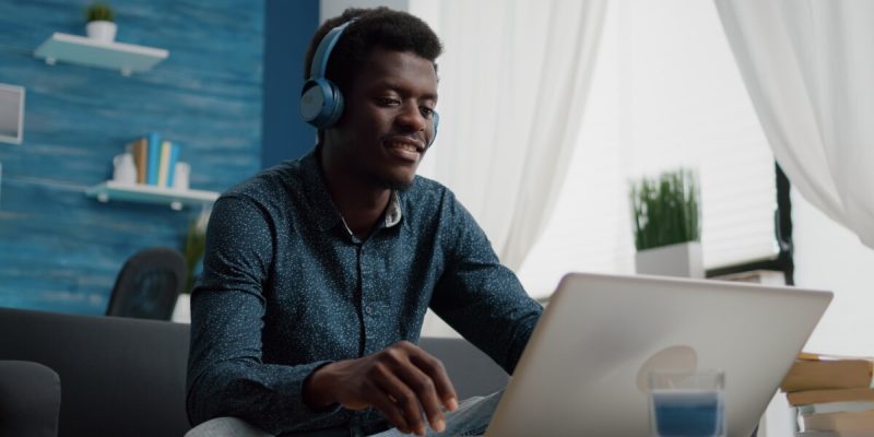 african-american-man-with-headphone-on-watching-movie-on-streaming-services.jpg